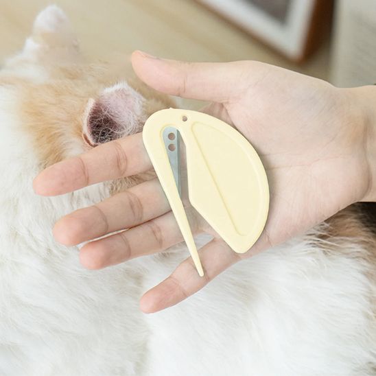 Démêleur à noeud pour chat